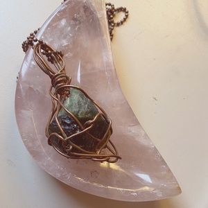 Large Mauldivite and Green Tourmaline Crystals wrapped in copper.  Healing stone